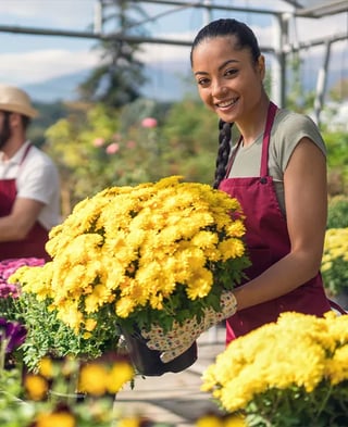 grower-colombia-front-view-woman-holding-flowers-outdoors.webp
