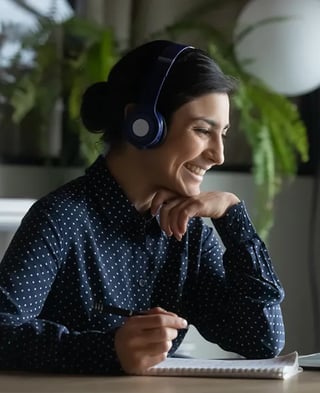 office-side-view-woman-desk-headset